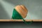 Wooden Spinning Top with Green Rope on a Shelf