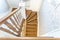 Wooden spiral staircase in bright interior in vacation house
