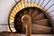 Wooden spiral stairs with protective railing