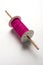 Wooden Spool or chakri/reel/fikri with pink or white thread
