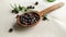 Wooden spoon with allspice, pepper, horseradish