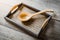 Wooden spoon on Chinese bamboo woven tray