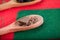 Wooden spoon with chopped chocolates on christmas table
