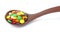 Wooden spoon filled with candy