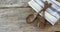 Wooden spoon and fork with napkin on table