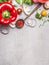 Wooden Spoon and Healthy vegetables and seasoning ingredients for fresh tasty cooking on gray stone background, top view composin