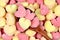 Wooden spoon on a many gnocchi hearts