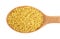 Wooden spoon with millet gruel on white background.