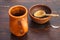 Wooden spoon and pottery.