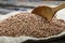 Wooden spoon of roasted buckwheat. gluten free ancient grain for healthy diet