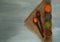 Wooden spoon and various cereals in metal cups on burlap, the concept of healthy eating. Top view. Rustic background