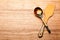 A wooden spoon and a wooden spatula. kitchen set