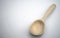 Wooden spoon with your own hands .Wood products. White background for the text. Craft.