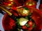 Wooden spoons and kitchen tableware. Closeup. Khokhloma - an ancient Russian folk craft XVII century.