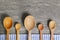 Wooden spoons with napkin on a rustic wooden table. Flat lay, top view, copy space banner