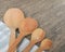 Wooden spoons with napkin on a rustic wooden table. Flat lay, top view, copy space banner