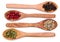 Wooden spoons with peppers from above