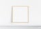 Wooden squared frame leaning on white shelve in interior mockup 3D rendering