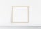 Wooden squared frame leaning on white shelve in interior mockup 3D rendering