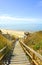 Wooden staircase at the Cliff of Asperillo in Mazagon beach in province of Huelva, Andalusia, Spain