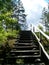 Wooden staircase on the cliff. Descent or ascent. Natural idyll. Kondopoga district, Karelia, Russia. Summer in the Scandinavian