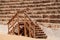 Wooden staircase leads to ancient amphitheater stadium seating on the harbor town of King Herod`s Caesarea Maritima