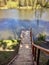 Wooden staircase, pier, descent to the water on a lake