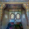 Wooden staircase, Turkish ceramic tiles wall and stained glass windows at Manial Palace of Prince Mohammed Ali, Cairo, Egypt