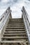 Wooden stairs ascending to the sky