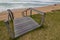 Wooden Stairs Leading from Grassed Area onto Beach
