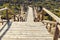 Wooden stairway down to the park on sand dunes