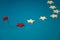 wooden stars and one red on a blue background with a red flag