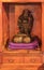 Wooden statue depicting one of the Seven Lucky Gods, Daikokuten, the god of wealth, household and kitchen