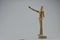 a wooden statue showing an example of a teacher\\\'s explaining movement