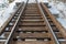 Wooden and steel railroad bridge in the rural snowy cold Minnesota winter