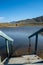 wooden steps into the lake go down. A flooded football stadium