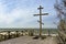 Wooden steps to the sea shore, wooden Orthodox cross