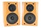 Wooden stereo speakers on white