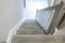 Wooden stylish staircase in the house. Interior.