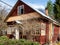 wooden summer house in village in early spring