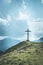 Wooden summit cross in the Austrian mountains: Cloudy weather