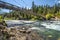 The wooden suspension bridge over the Spokane River at the Bowl and Pitcher area of Riverside State Park in Spokane, Washington.