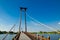 The wooden suspension bridge span that across the small lake at Wareepirom Park.