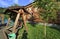 Wooden swing on the territory of the Tourist complex