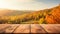 a wooden table amidst the vibrant colors of fall, creating a serene atmosphere.