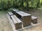 Wooden table and benches in the park. Picnic in the park.