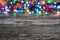 Wooden table and blurred Christmas lights background