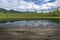 Wooden table from boards on forest mountain lake