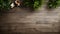 Wooden table with a coffee cup and plants