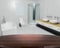 Wooden table with defocussed contemporary bathroom